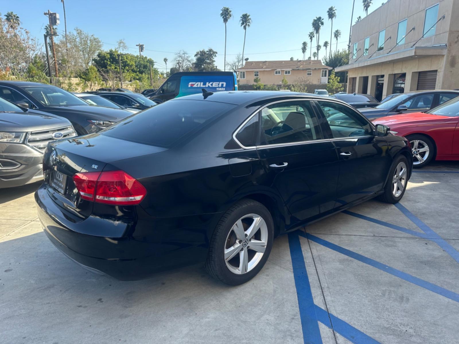 2013 Black /BLACK Volkswagen Passat (1VWBP7A30DC) , located at 30 S. Berkeley Avenue, Pasadena, CA, 91107, (626) 248-7567, 34.145447, -118.109398 - Low Miles!! Crown City Motors is a used “Buy Here Pay Here” car dealer in Pasadena CA. “Buy Here Pay Here” financing, means that when you purchase your vehicle from our dealership, that you make the payments to the dealership as well. We do not need the banks approval to get you approved - Photo #5